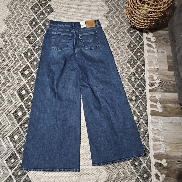 Levi's 728 High Rise Wide Leg Woodstock Slim Through Hip Relaxed Through Thigh - Picture 5 of 16
